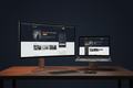 Business Website design package by DD Network — dual screen setup showing a premium business website
