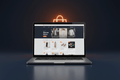Shopify Starter store setup package by DD Network — laptop showing a beautifully designed Shopify store